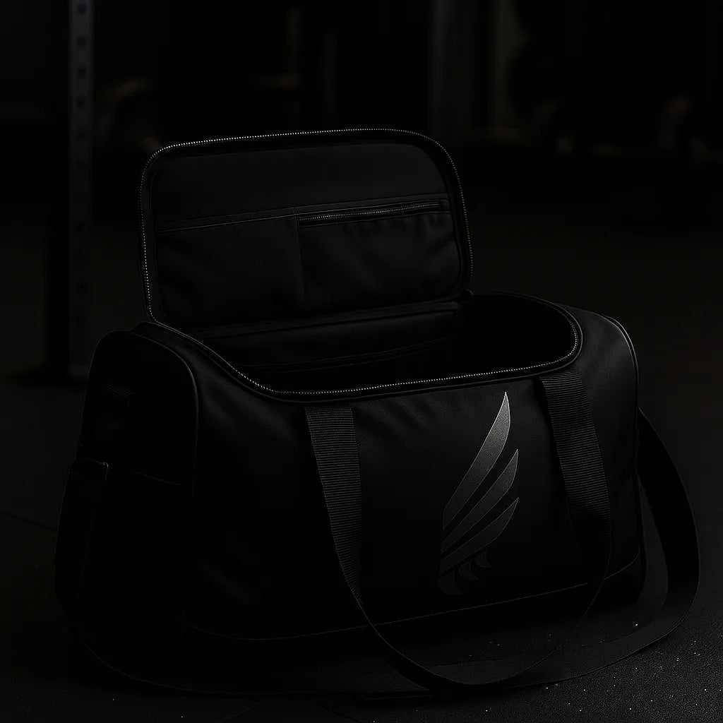 Open NIVɅYS gym bag showing its spacious interior and organization, made from sustainable materials.