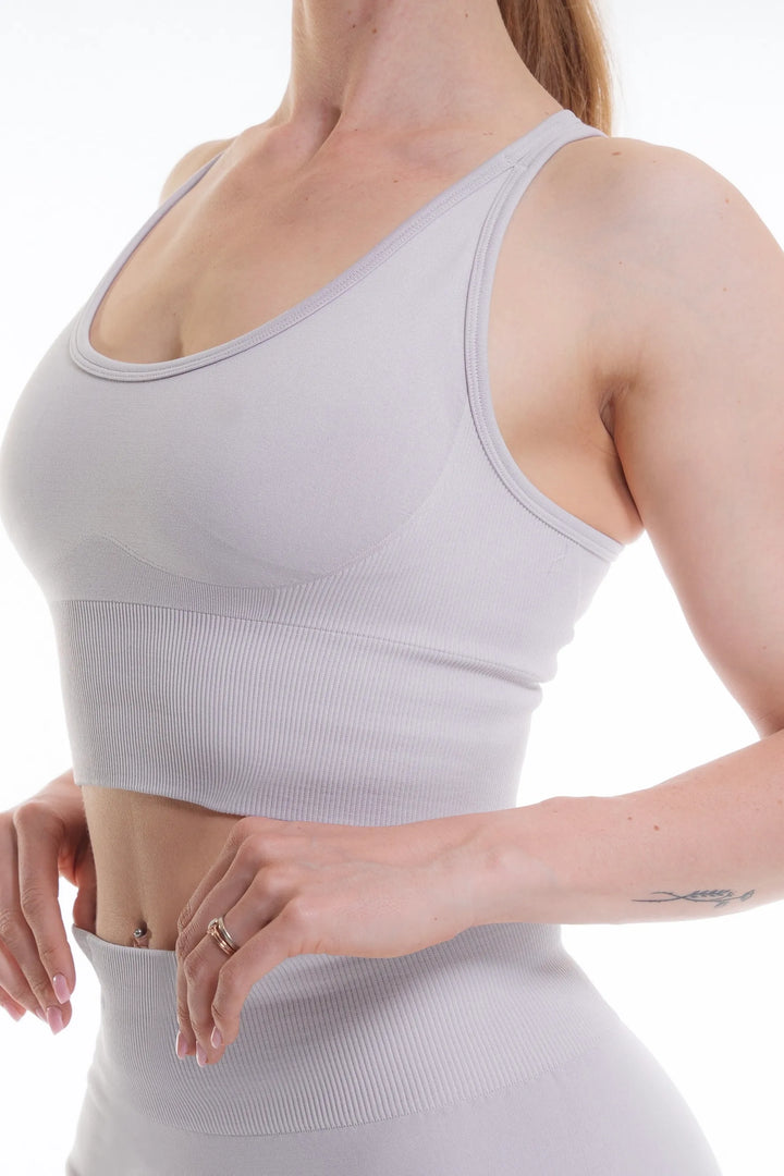 NIVɅYS sports bra made from breathable, sustainable recycled fabric for active wear.
