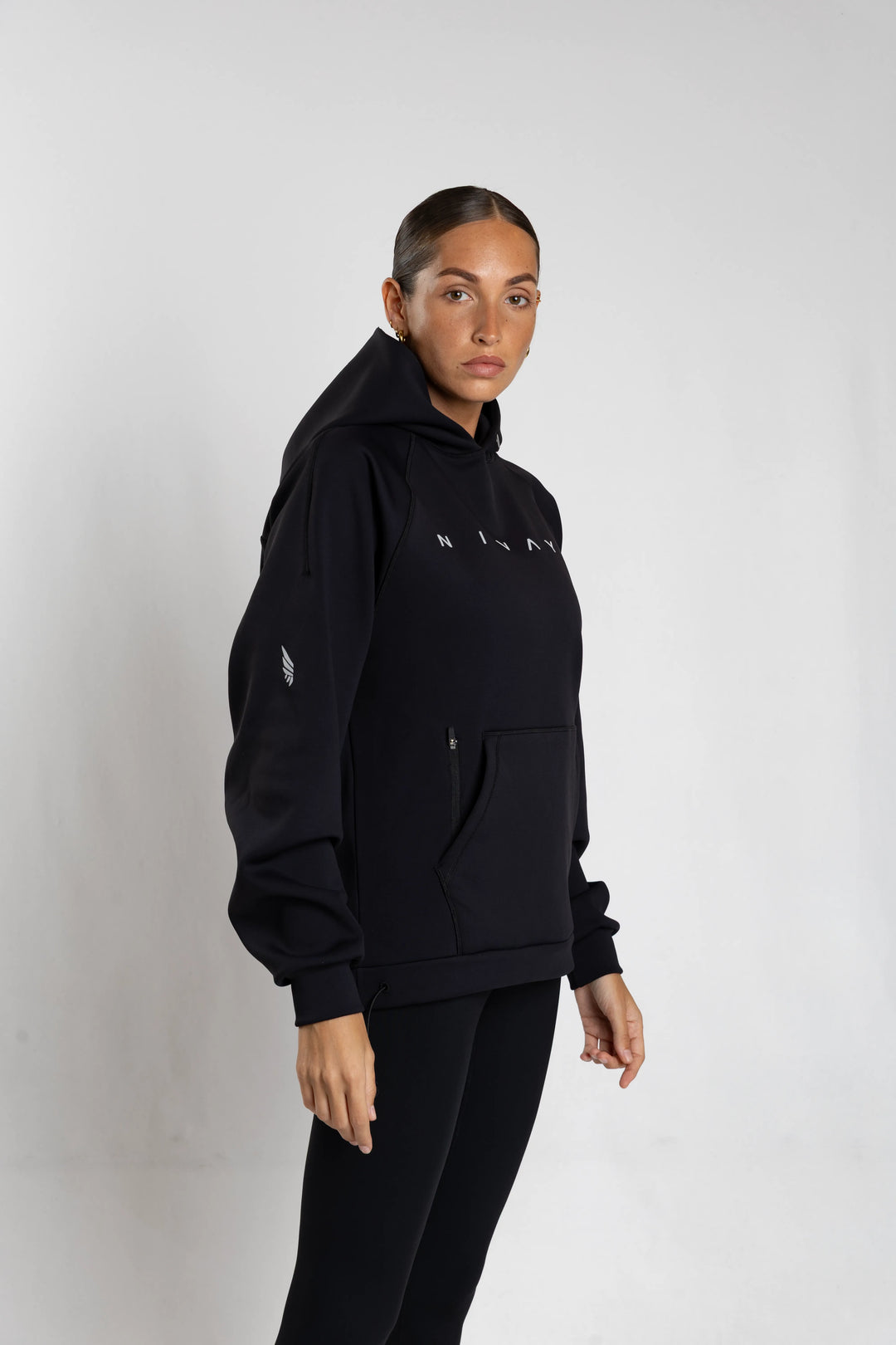 Women wearing NIVɅYS sustainable activewear showing fit and mobility.