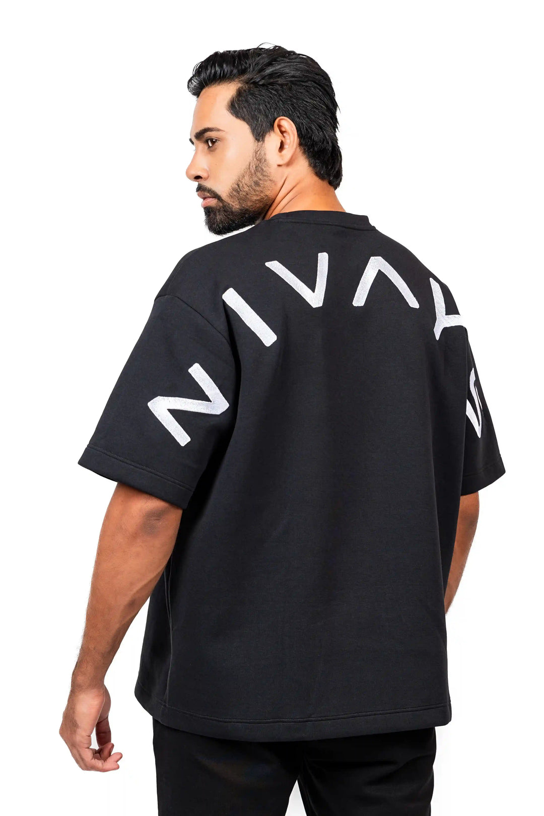 NIVɅYS sustainable activewear mid‑stride eco‑friendly workout clothes